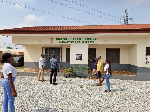 Volunteers and staff outside the Dakwadwom CHPS building